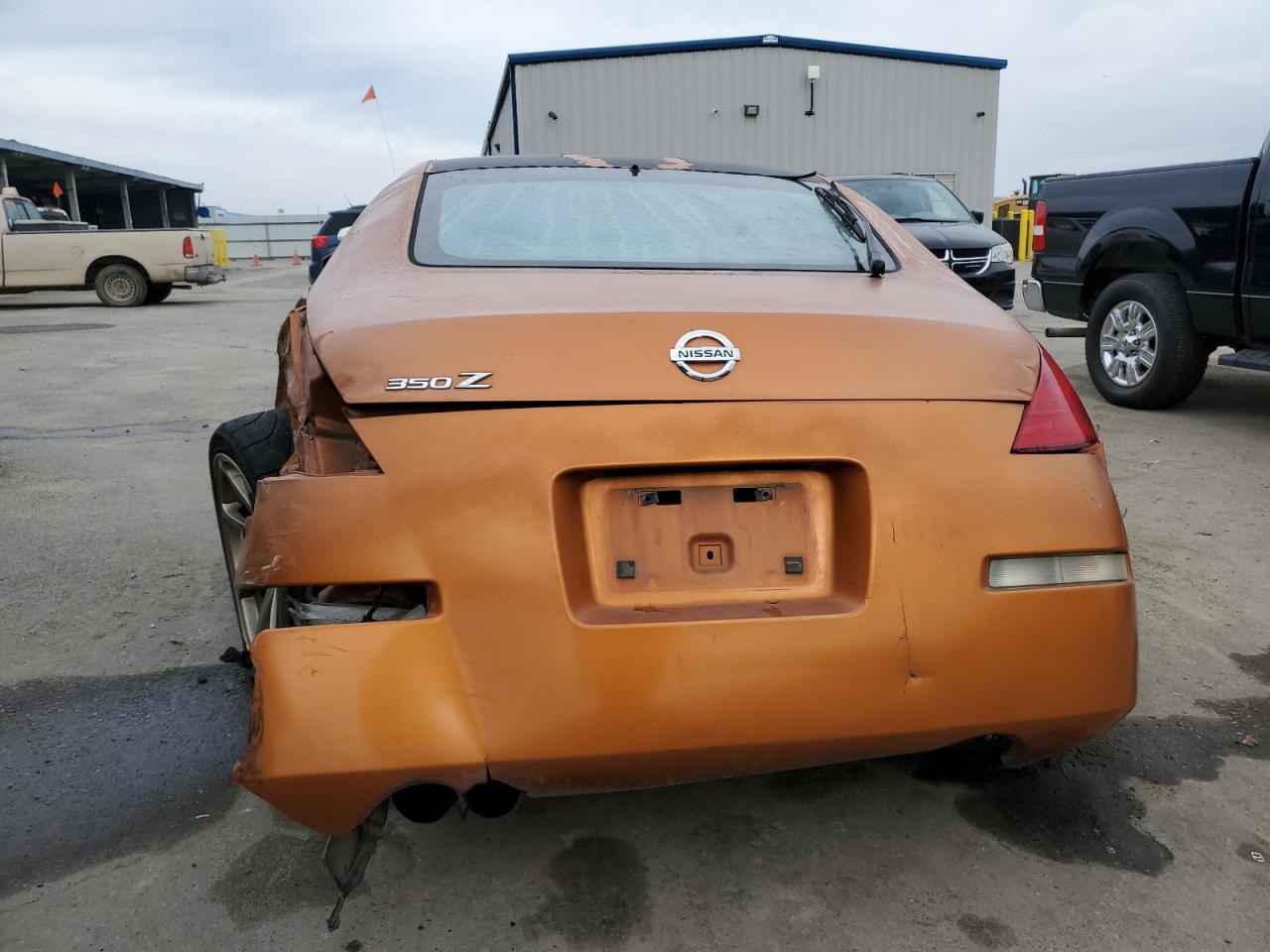 2004 Nissan 350Z VIN JN1AZ34D84T165195 Copart auction photo, all over damage thumbnail 6