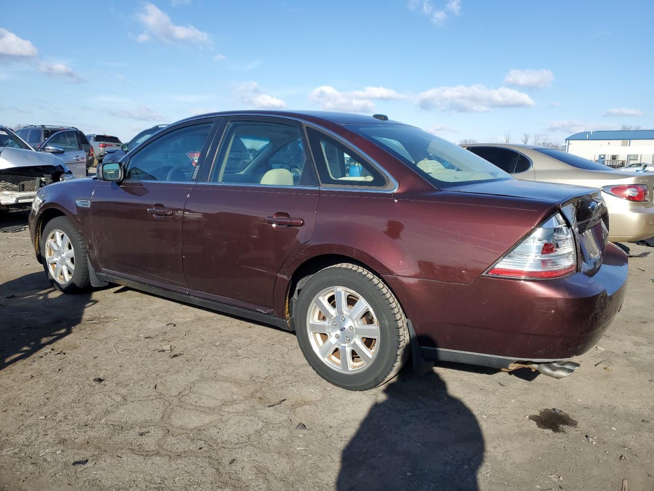 2009 Ford Taurus VIN 1FAHP23W49G106097 Copart auction photo, front end / rear end damage thumbnail 2