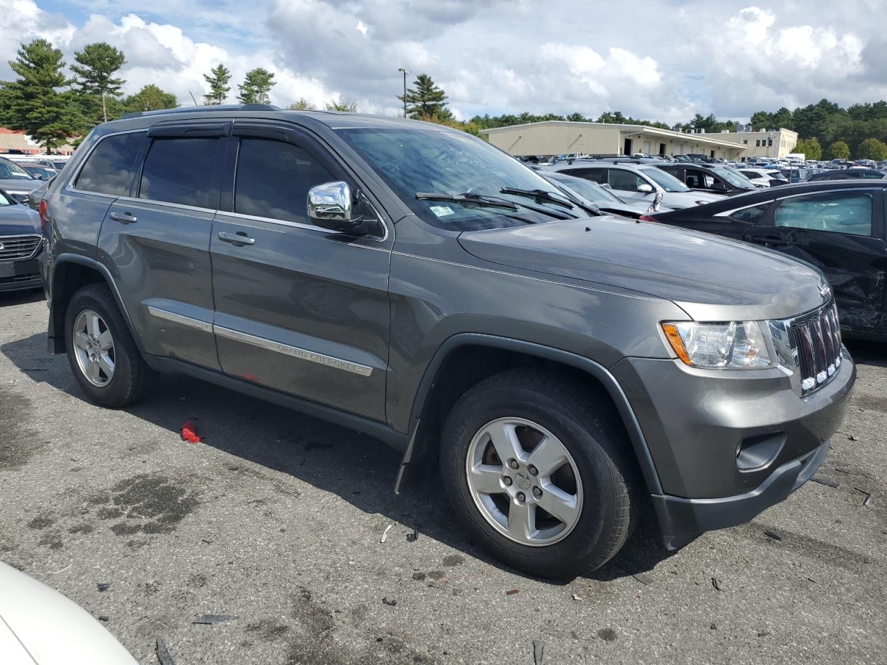 2012 Jeep Grand Cherokee VIN 1C4RJFAG2CC352048 Copart auction photo, side / front end damage thumbnail 4