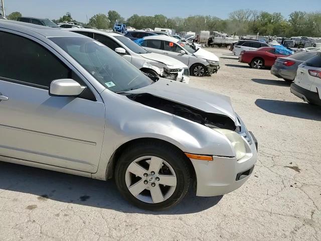 2009 Ford Fusion VIN 3FAHP07Z39R113933 Copart auction photo, front end damage thumbnail 11