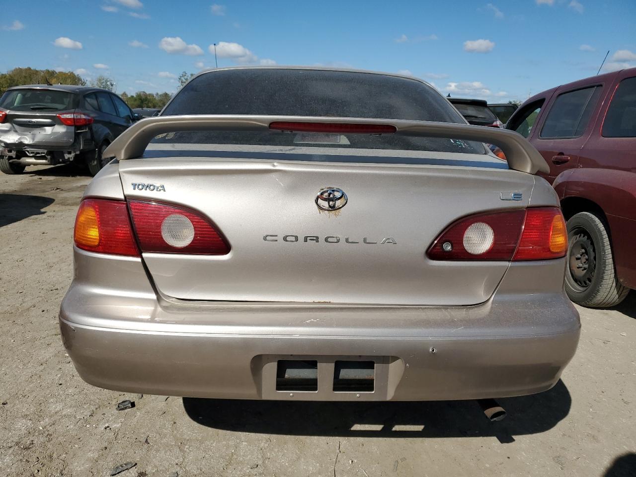 2001 Toyota Corolla VIN 1NXBR12E11Z455877 Copart auction photo, side / rear end damage thumbnail 6