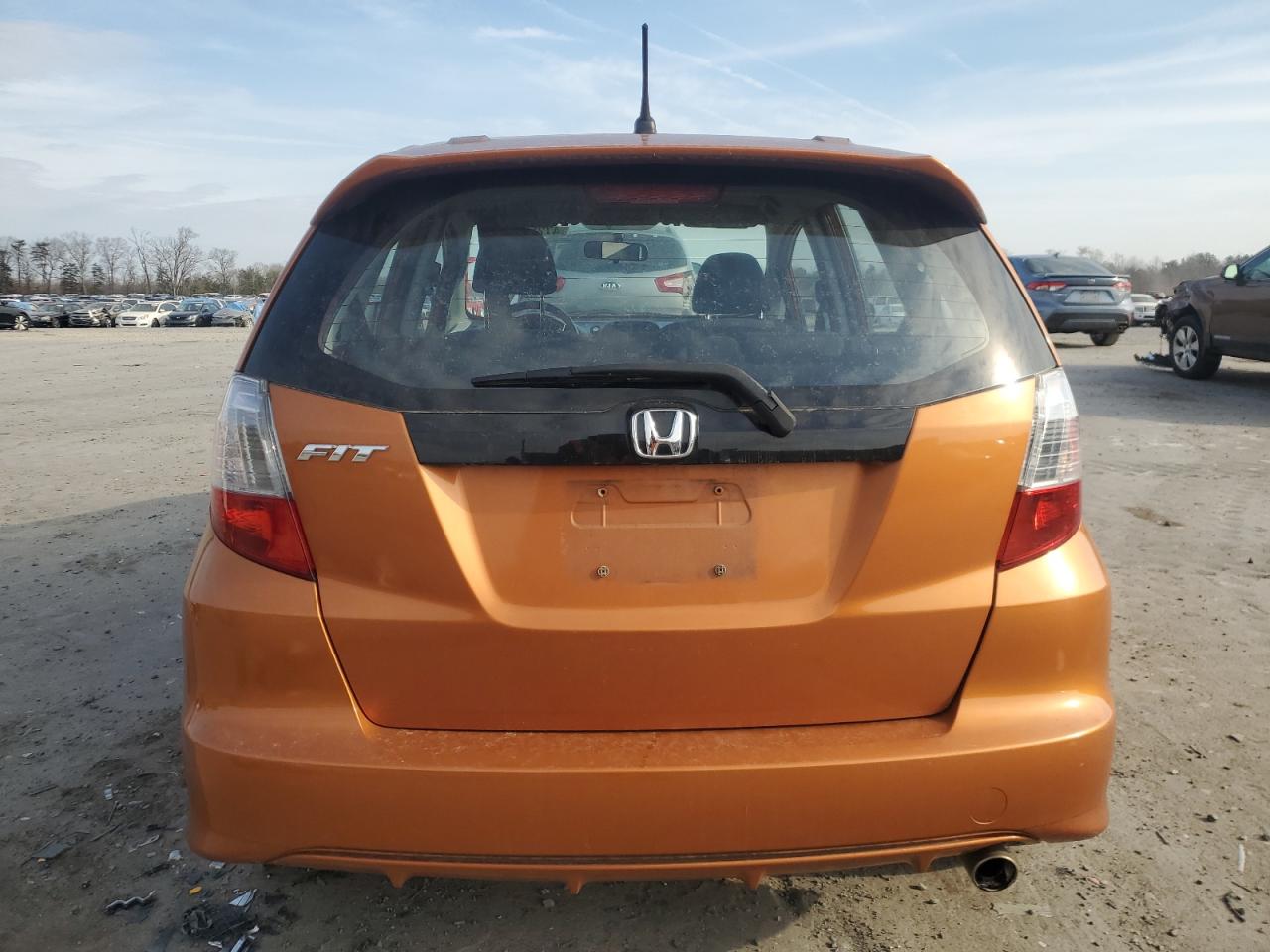 2010 Honda Fit VIN JHMGE8H41AC009679 Copart auction photo, front end / minor dent/scratches damage thumbnail 6