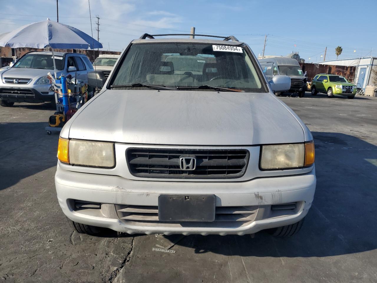 1999 Honda Passport VIN 4S6CK58W3X4414697 Copart auction photo, minor dent/scratches damage thumbnail 5