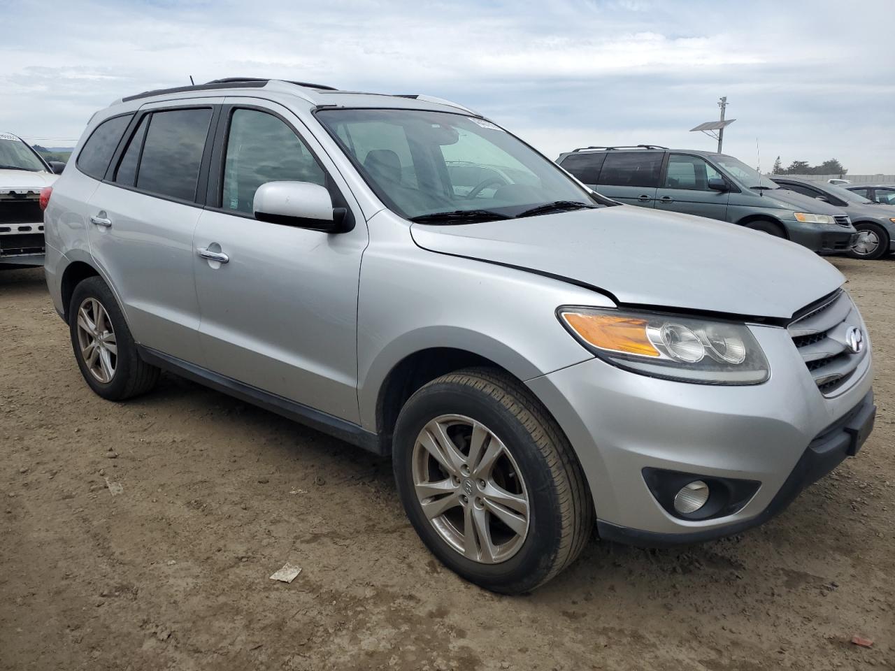 2012 Hyundai Santa Fe VIN 5XYZK4AG3CG127750 Copart auction photo, rear end damage thumbnail 4
