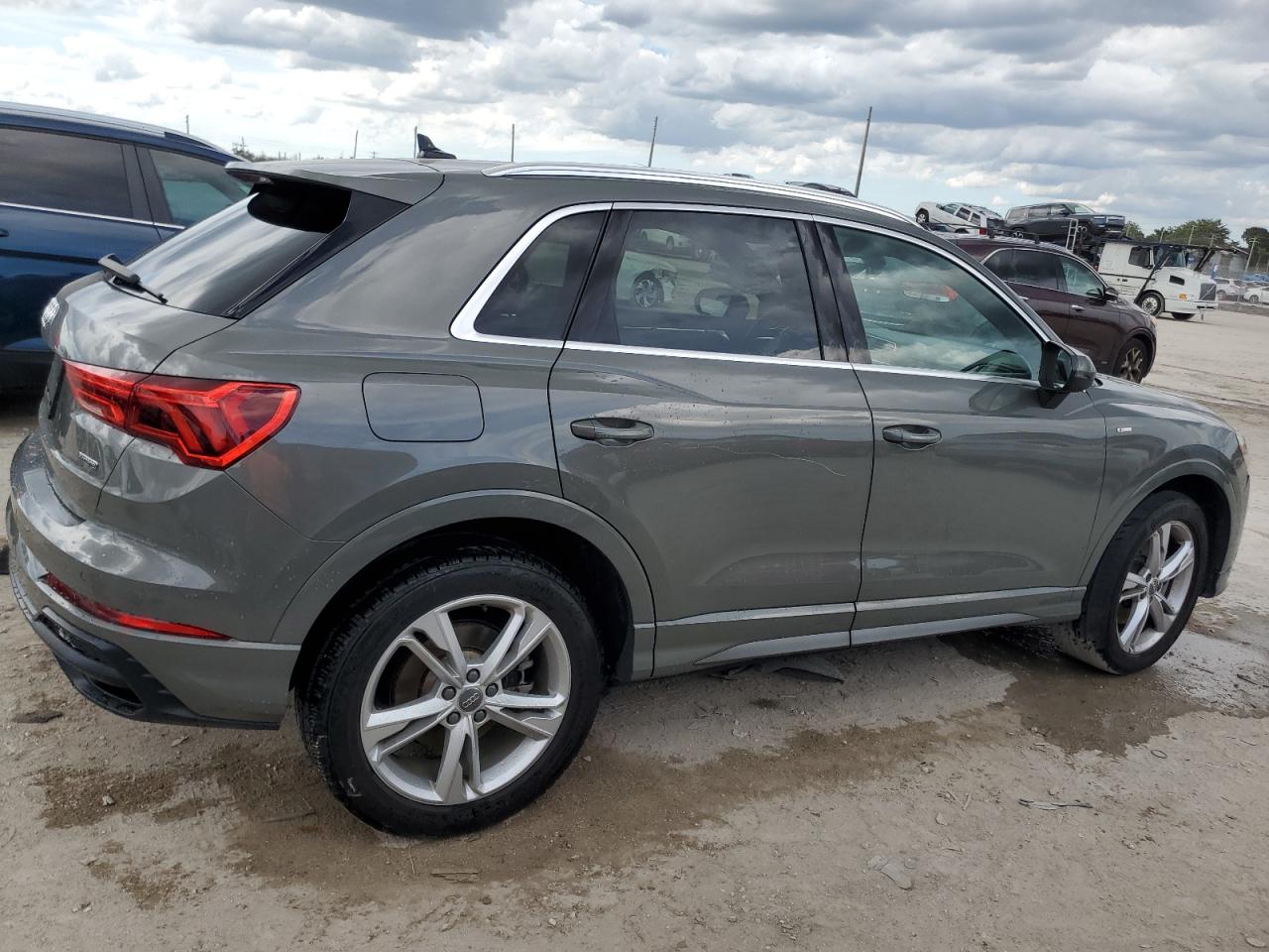 2020 Audi Q3 VIN WA1DECF38L1076385 Copart auction photo, side / partial repair damage thumbnail 3
