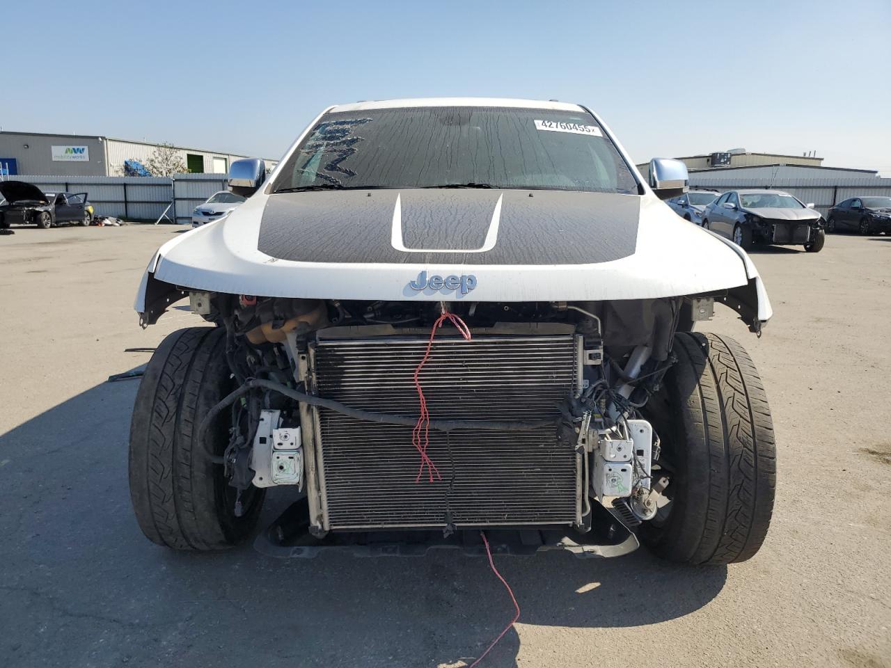 2017 Jeep Grand Cherokee VIN 1C4RJEBG0HC779731 Copart auction photo, front end damage thumbnail 5