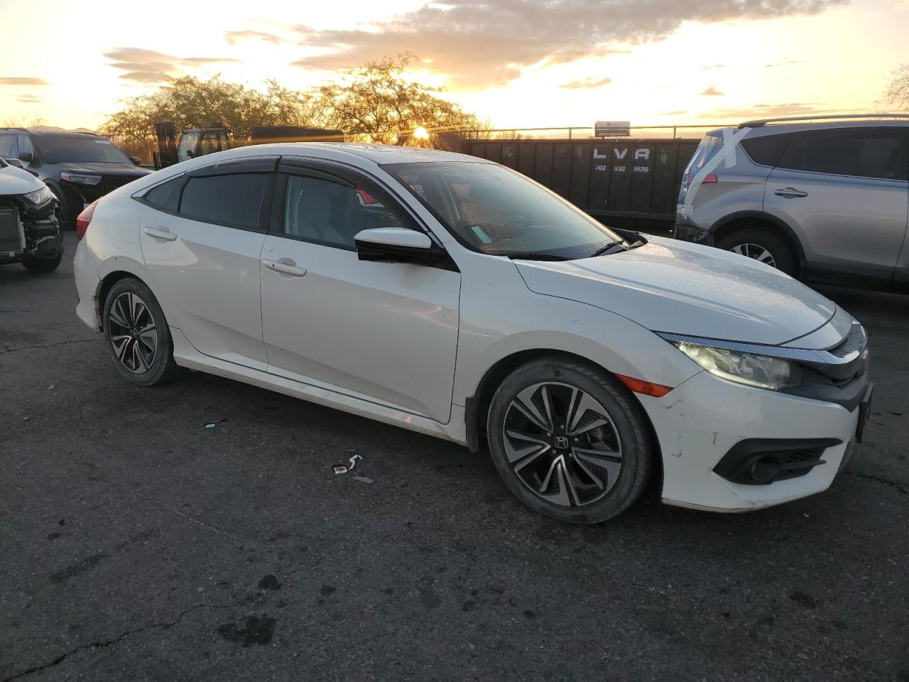 2017 Honda Civic VIN 19XFC1F3XHE211380 Copart auction photo, rear end / side damage thumbnail 4