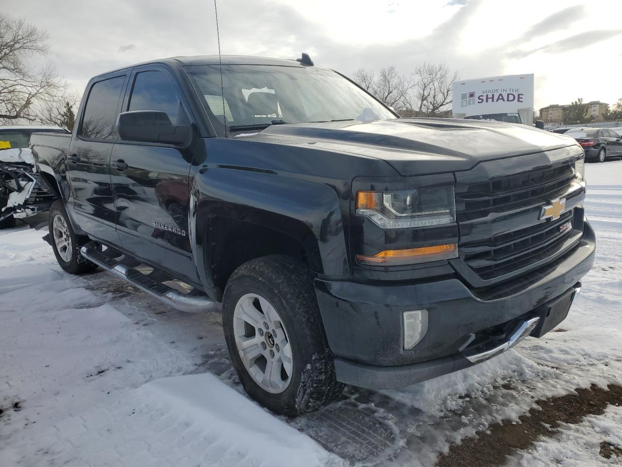 2018 Chevrolet Silverado VIN 3GCUKREC0JG184209 Copart auction photo, side / rear end damage thumbnail 4