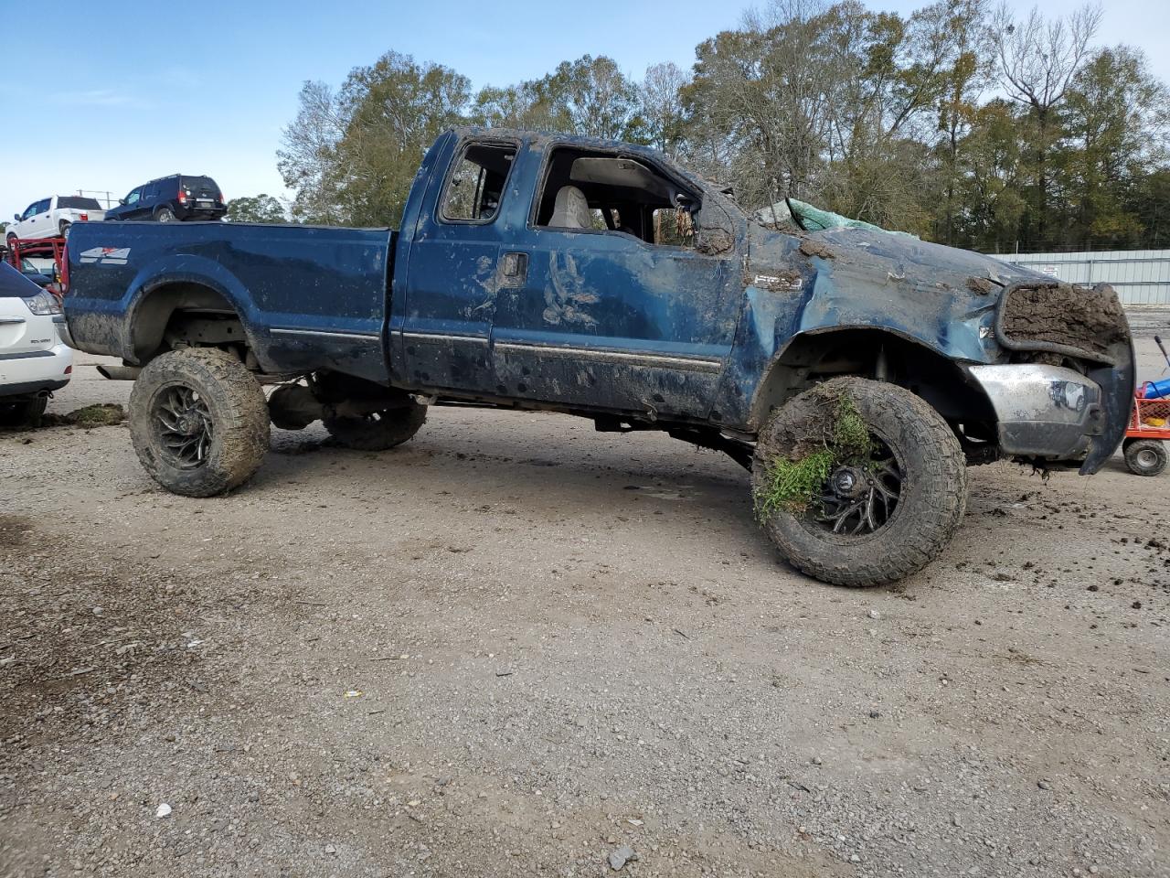 1999 Ford F250 VIN 1FTNX21F3XEB75792 Copart auction photo, all over damage thumbnail 4