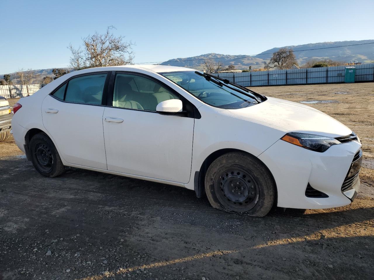 2017 Toyota Corolla VIN 5YFBURHE8HP662234 Copart auction photo, side / rear end damage thumbnail 4