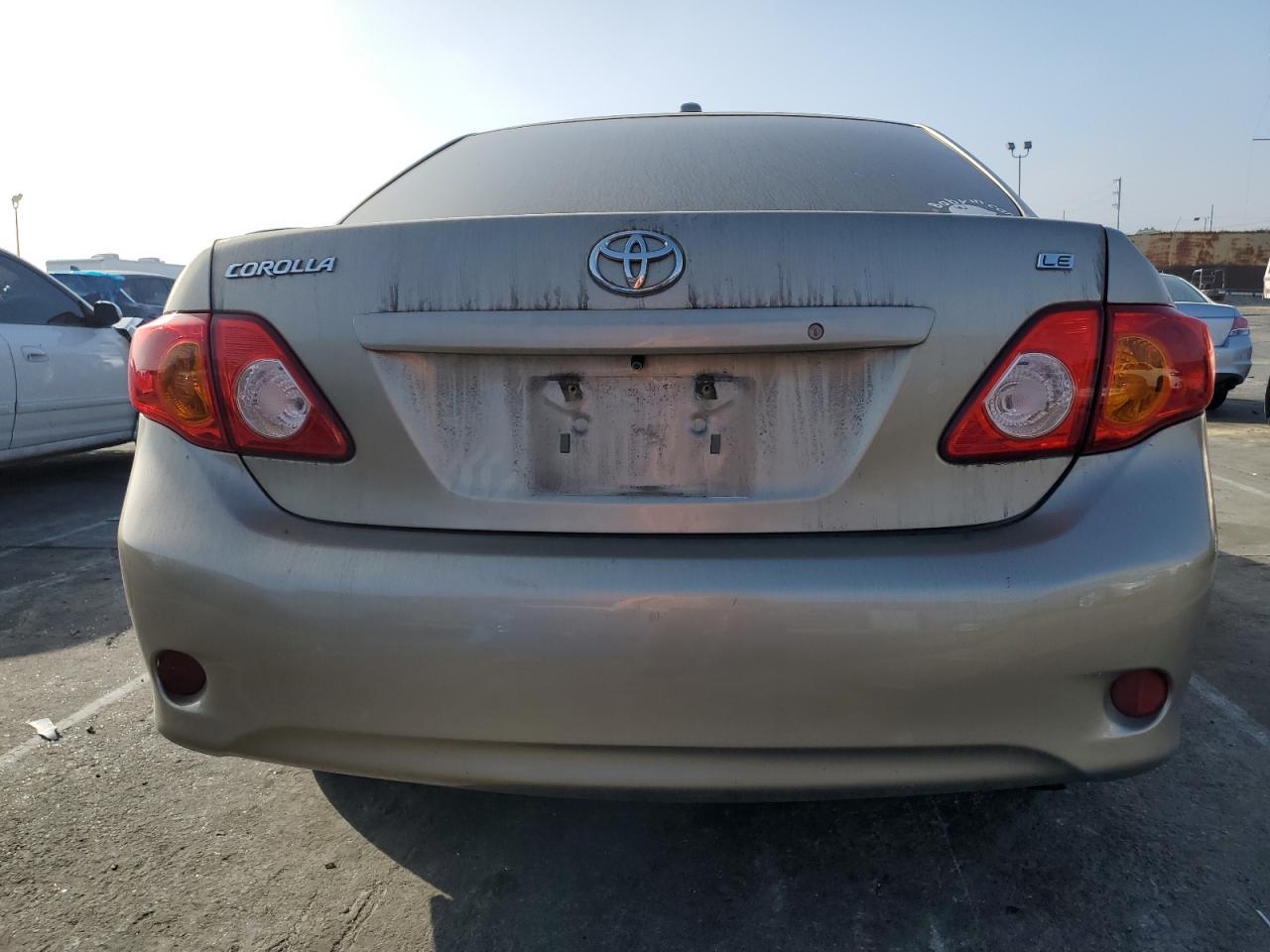 2009 Toyota Corolla VIN 1NXBU40E19Z070253 Copart auction photo, side / rear end damage thumbnail 6