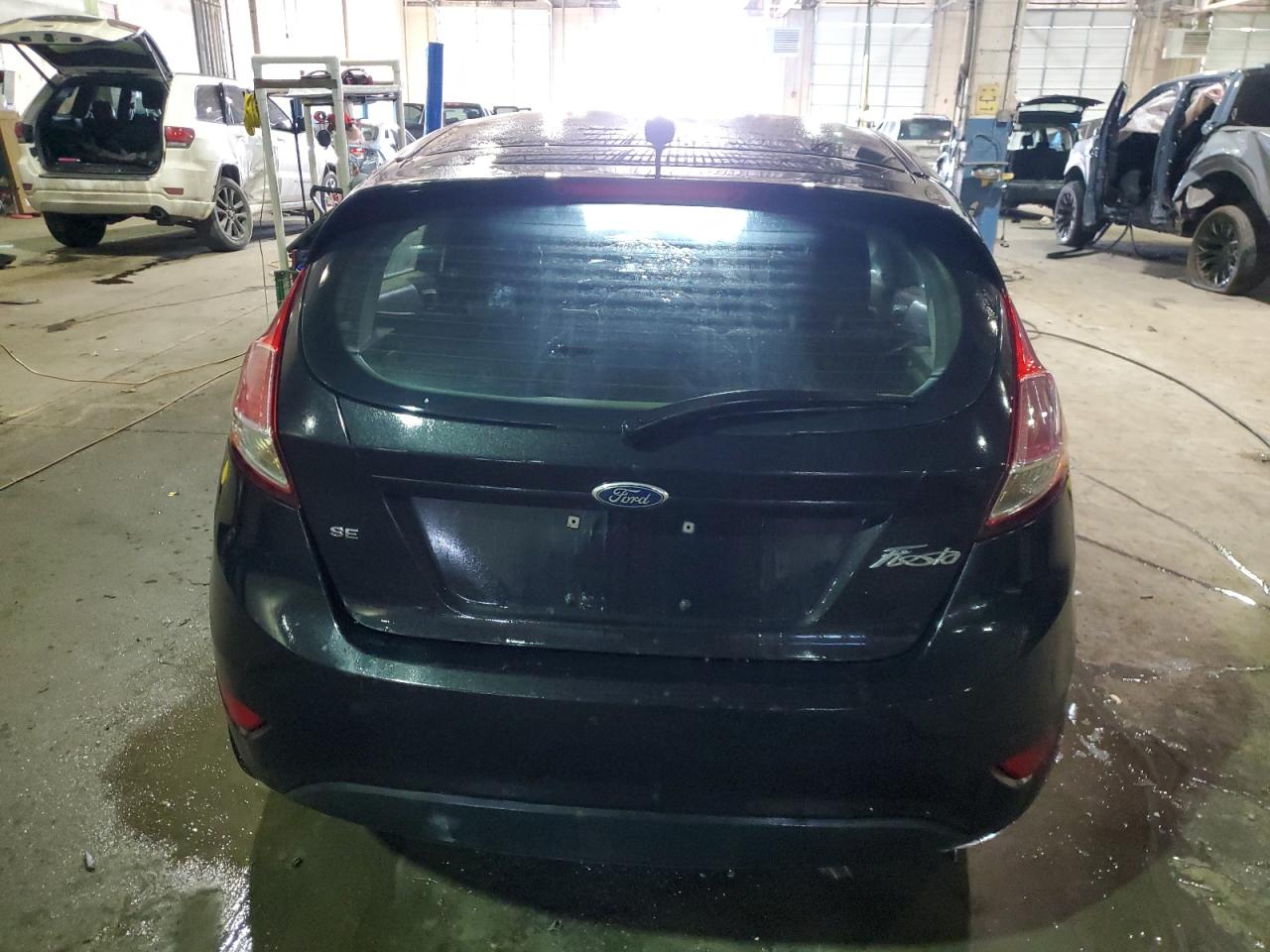2015 Ford Fiesta VIN 3FADP4EJ9FM213661 Copart auction photo, rear end / undercarriage damage thumbnail 6