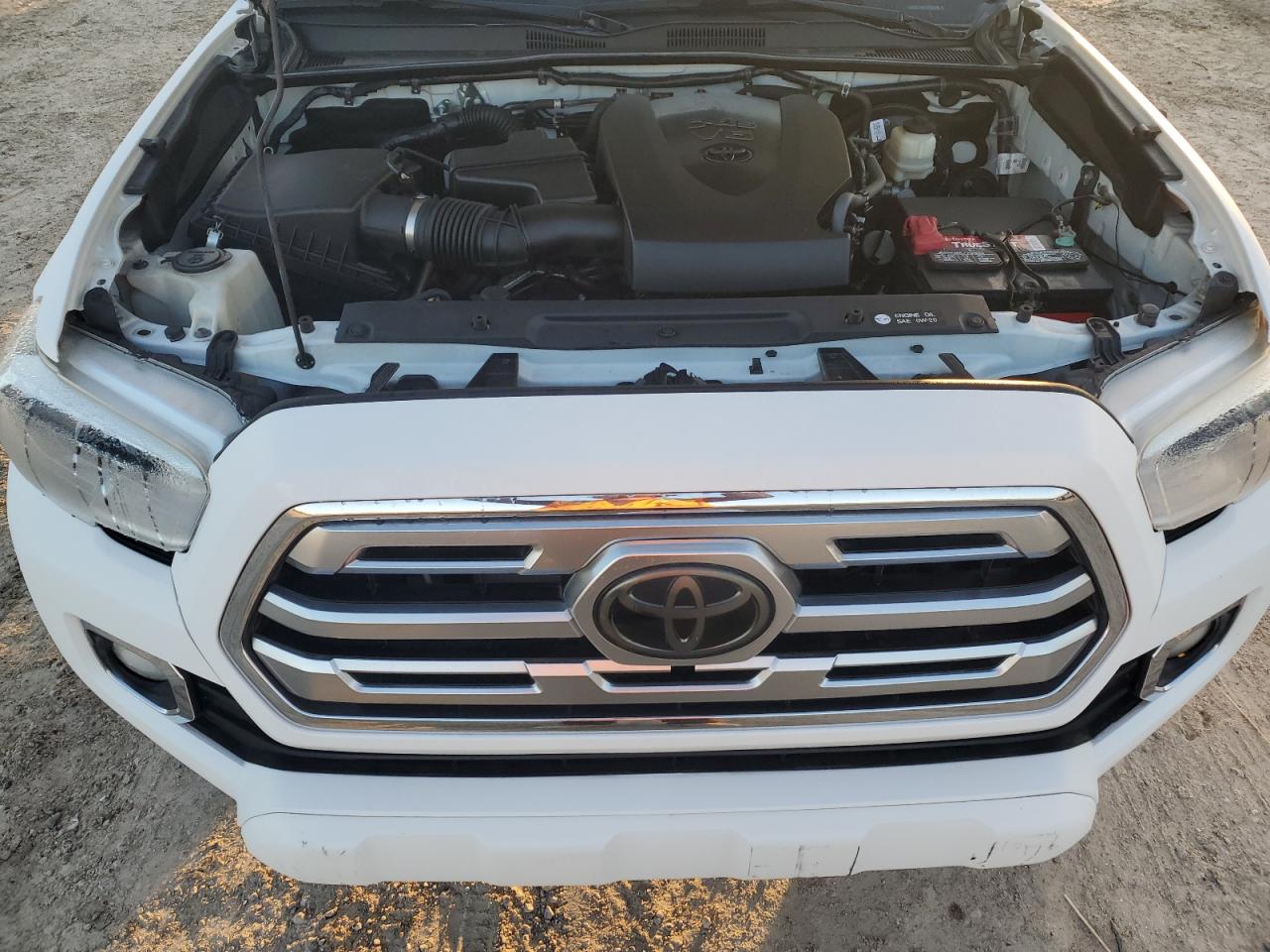 2018 Toyota Tacoma VIN 5TFEZ5CNXJX058903 Copart auction photo, rear end damage thumbnail 11