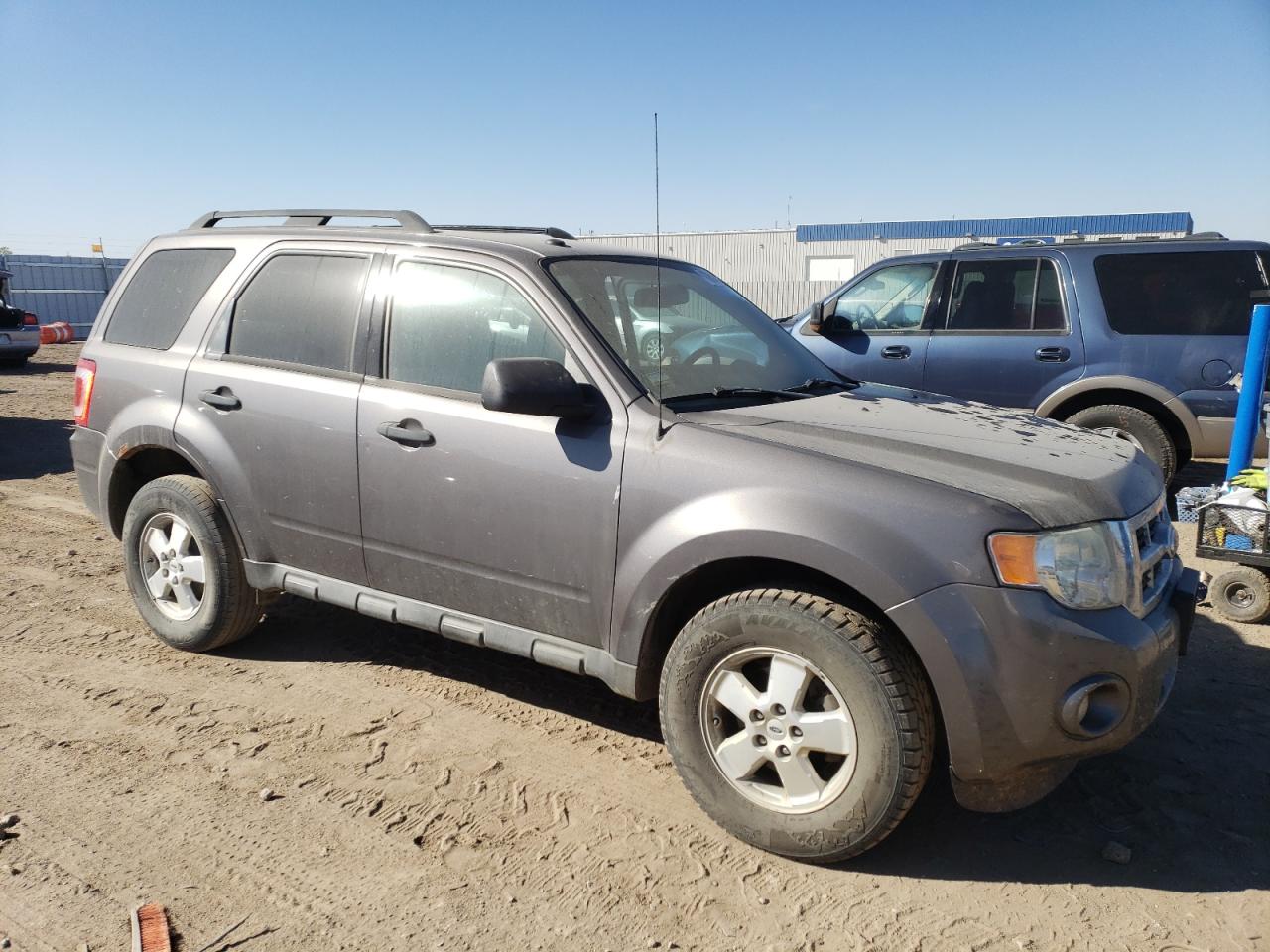 2011 Ford Escape VIN 1FMCU0DG1BKC42064 Copart auction photo, side / front end damage thumbnail 4