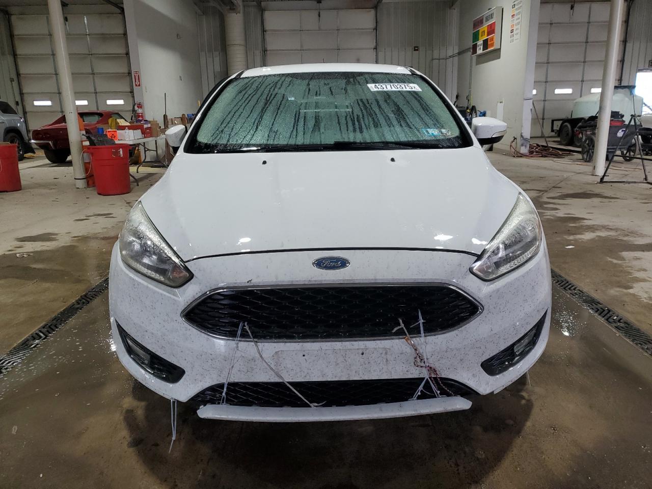 2016 Ford Focus VIN 1FADP3F20GL357359 Copart auction photo, side / front end damage thumbnail 5