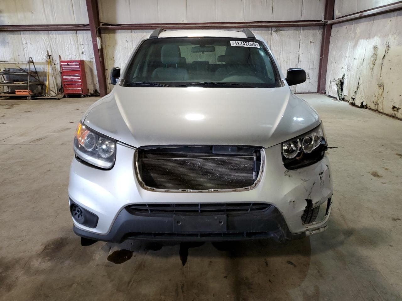 2012 Hyundai Santa Fe VIN 5XYZGDABXCG099807 Copart auction photo, front end / minor dent/scratches damage thumbnail 5