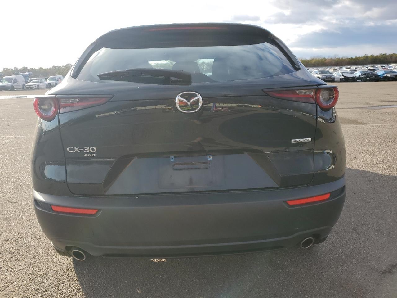2023 Mazda CX-30 VIN 3MVDMBAM5PM523586 Copart auction photo, front end / minor dent/scratches damage thumbnail 6