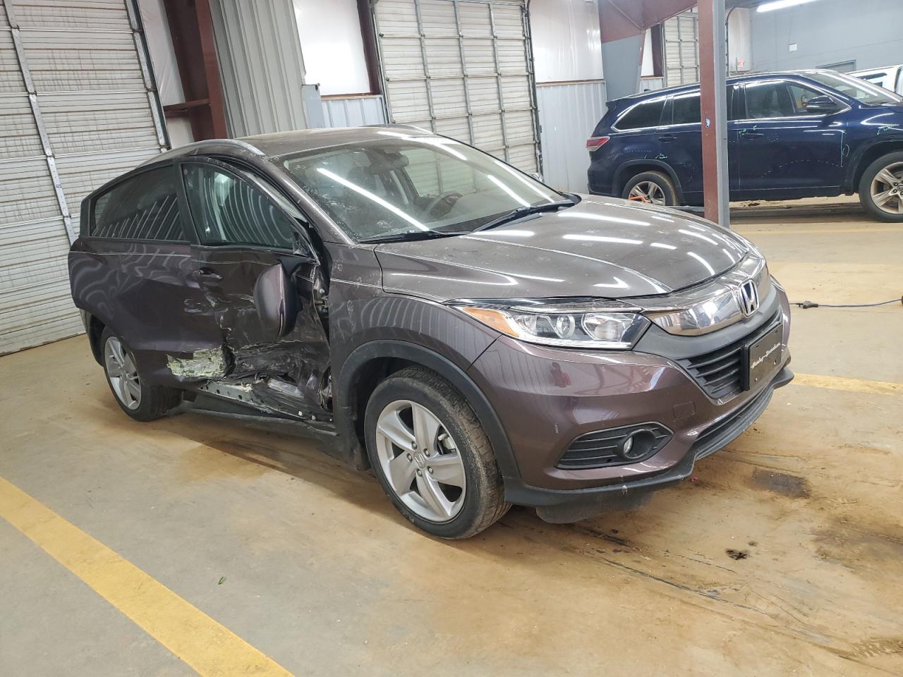 2019 Honda HR-V VIN 3CZRU6H54KM734410 Copart auction photo, side / front end damage thumbnail 4