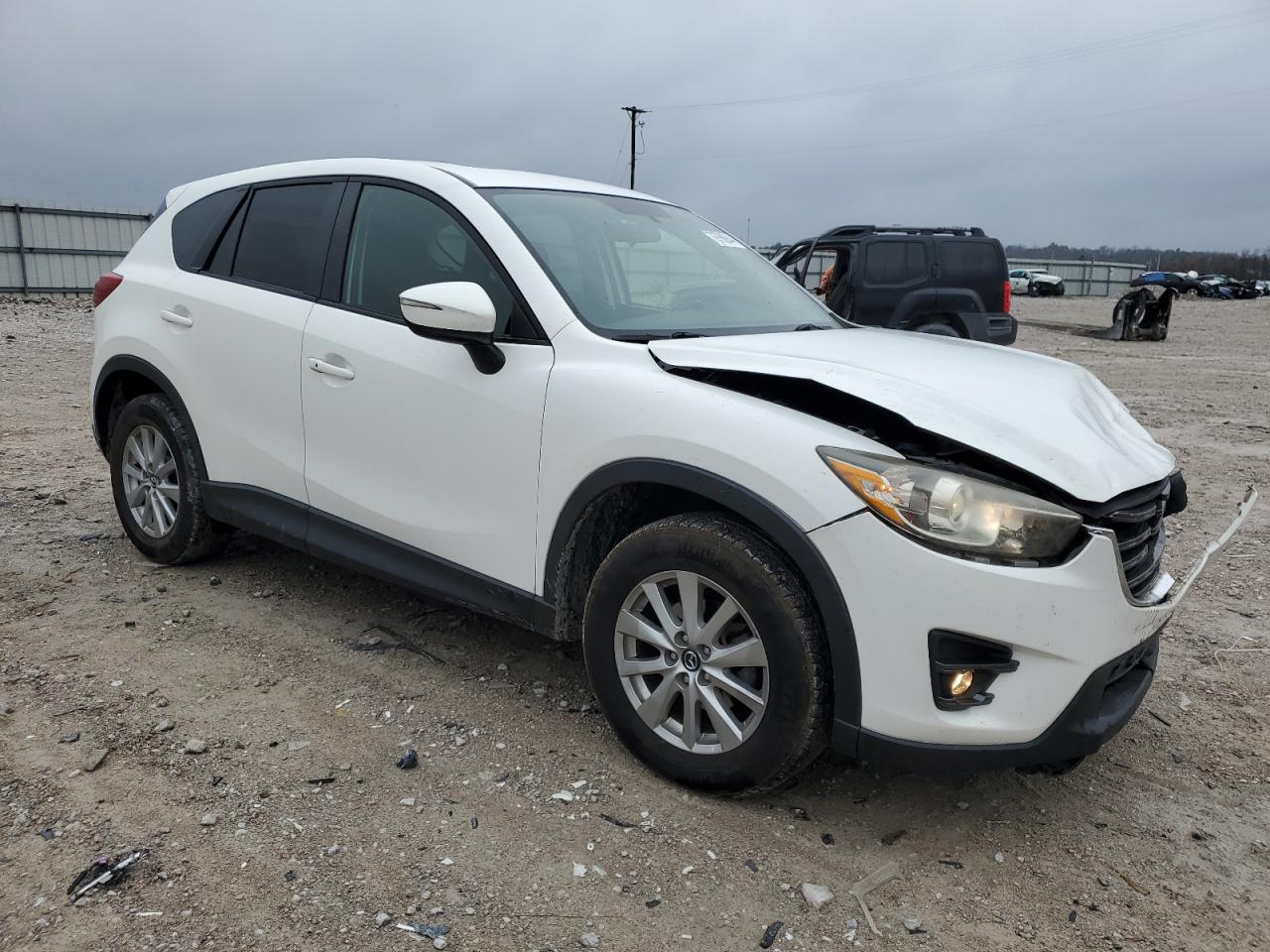 2016 Mazda CX-5 VIN JM3KE4CY1G0641226 Copart auction photo, front end damage thumbnail 4