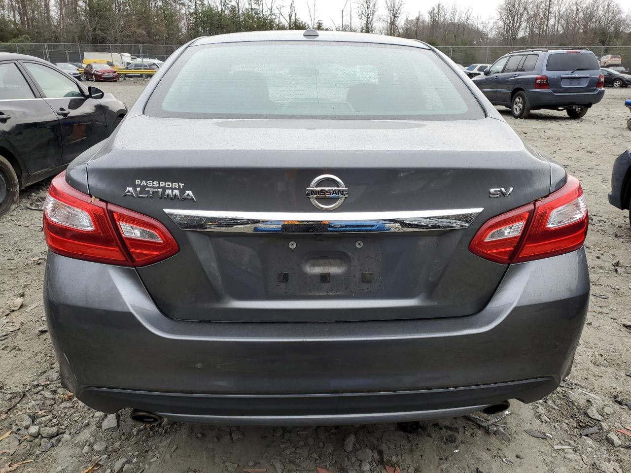 2016 Nissan Altima VIN 1N4AL3AP9GC166797 Copart auction photo, front end / minor dent/scratches damage thumbnail 6
