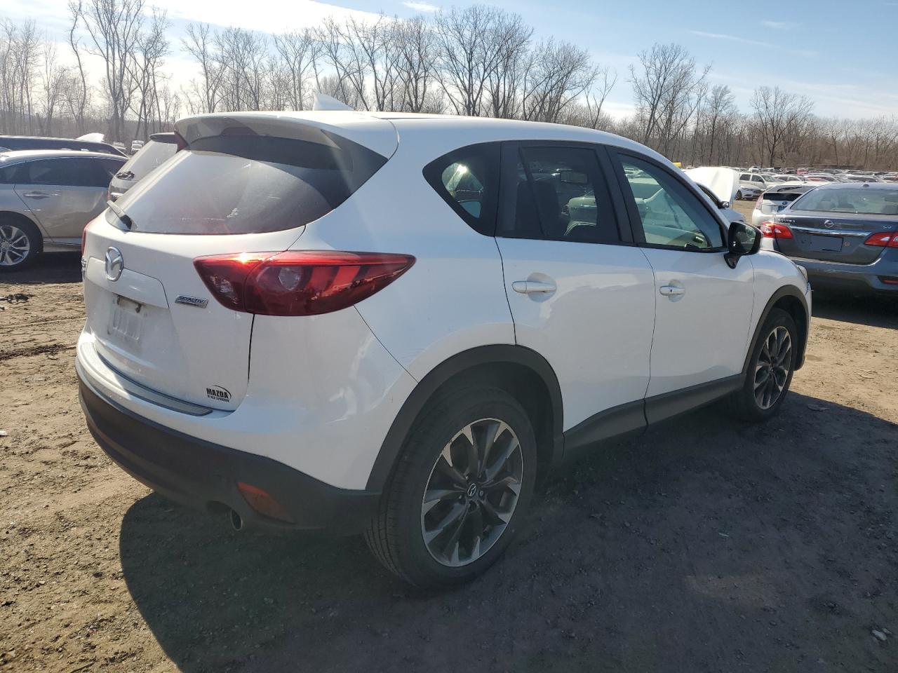 2016 Mazda CX-5 VIN JM3KE4DY8G0696643 Copart auction photo, front end damage thumbnail 3
