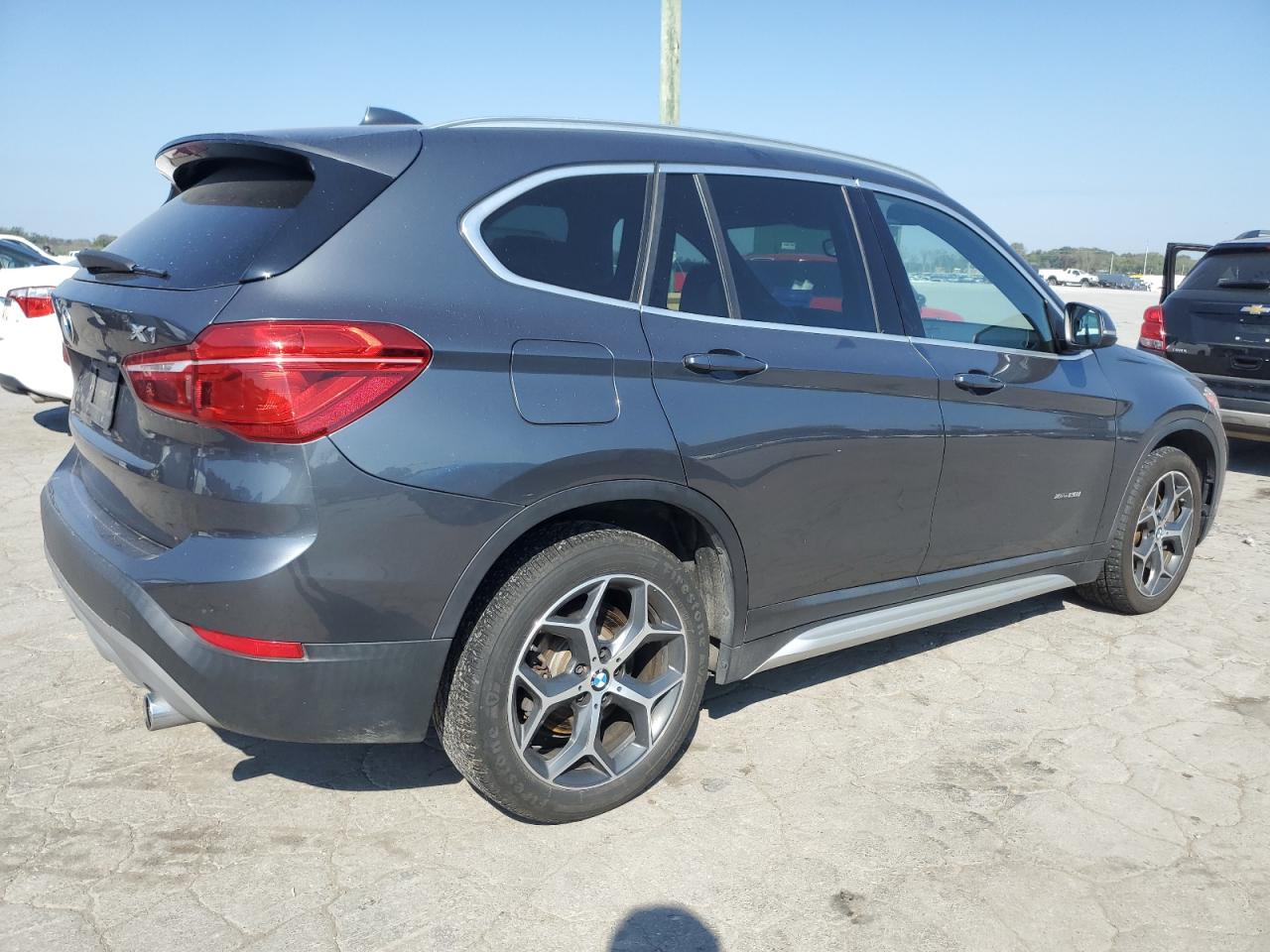 2018 BMW X1 VIN WBXHT3C34J5K30049 Copart auction photo, minor dent/scratches damage thumbnail 3