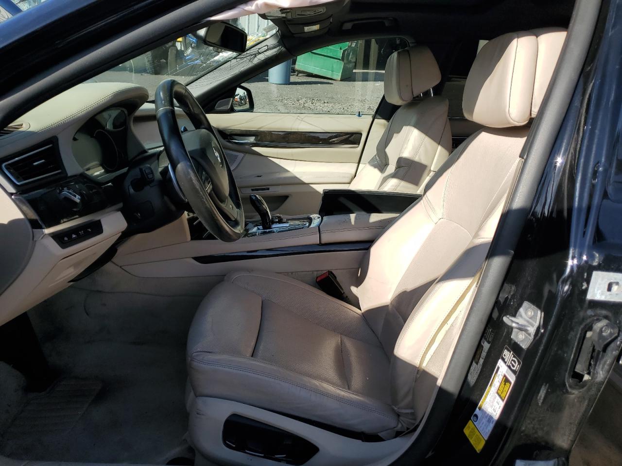 2015 BMW 7er VIN WBAYE8C53FD781802 Copart auction photo, all over / undercarriage damage thumbnail 7