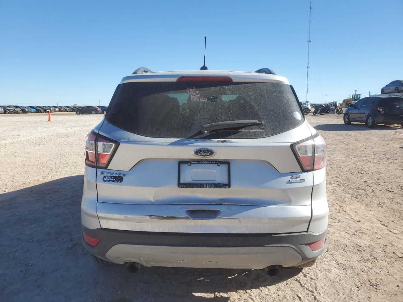 2018 Ford Escape VIN 1FMCU9GD0JUB09899 Copart auction photo, all over damage thumbnail 6