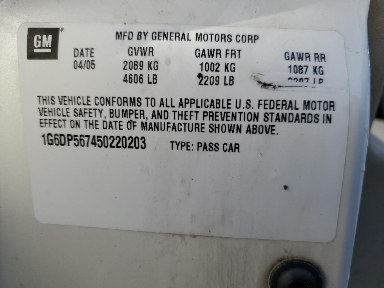 2005 Cadillac CTS VIN 1G6DP567450220203 Copart auction photo, side / hail damage thumbnail 13