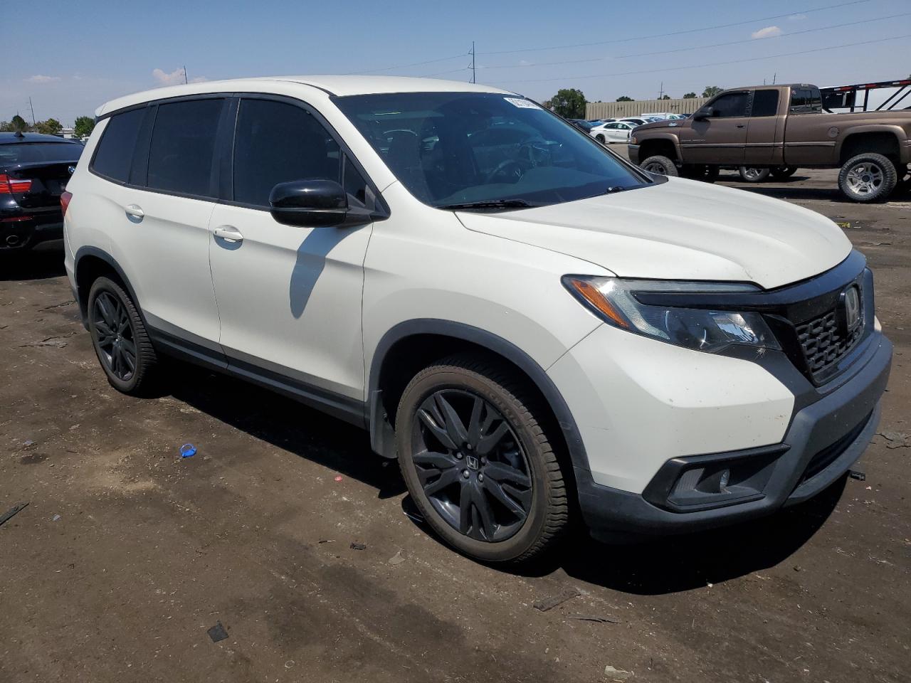 2019 Honda Passport VIN 5FNYF8H26KB006301 Copart auction photo, hail damage thumbnail 4
