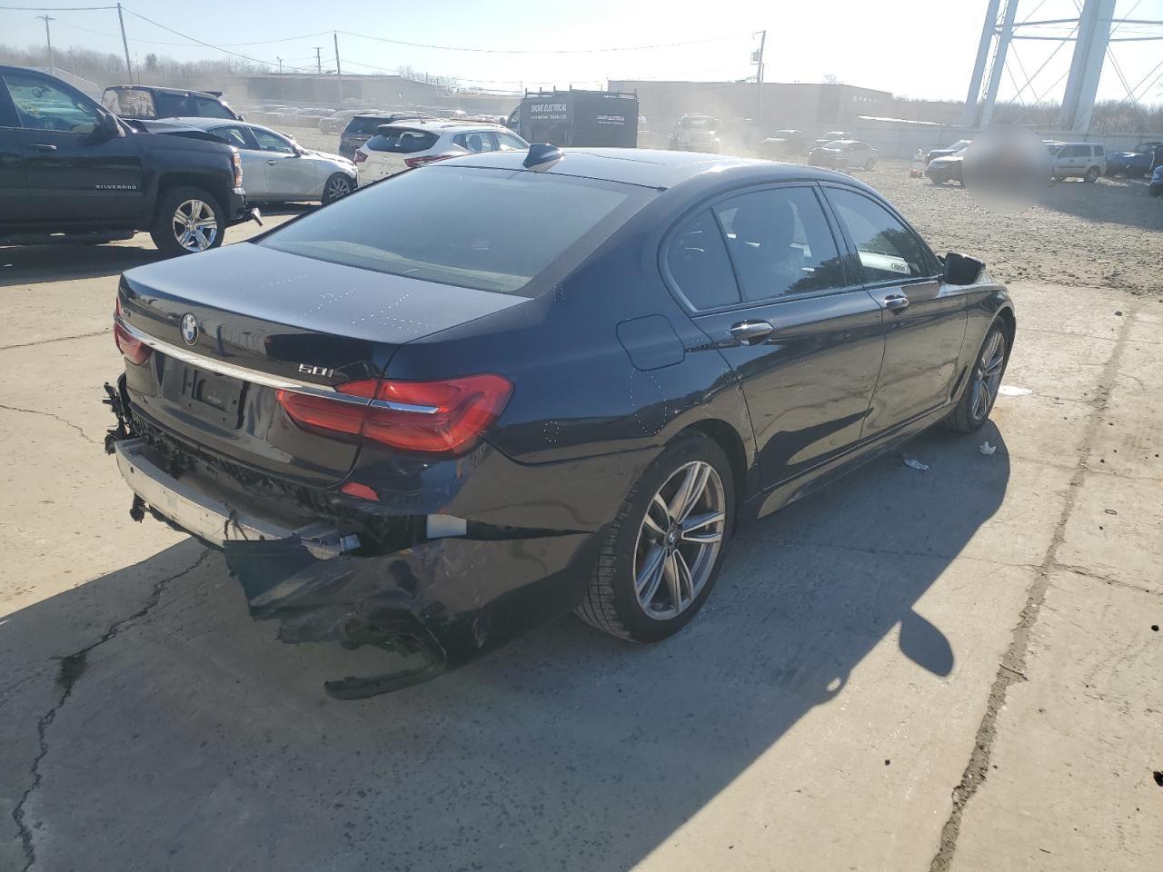 2016 BMW 7er VIN WBA7F2C55GG416656 Copart auction photo, rear end damage thumbnail 3