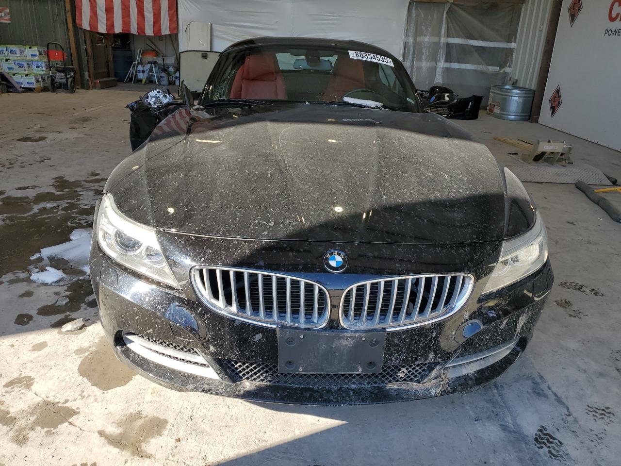 2015 BMW Z4 VIN WBALM7C52FJ799104 Copart auction photo, all over damage thumbnail 5