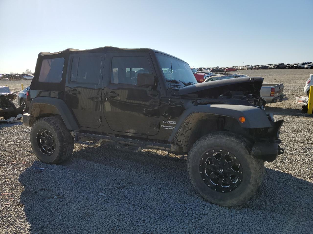 2015 Jeep Wrangler VIN 1C4BJWDG4FL555332 Copart auction photo, front end / side damage thumbnail 4