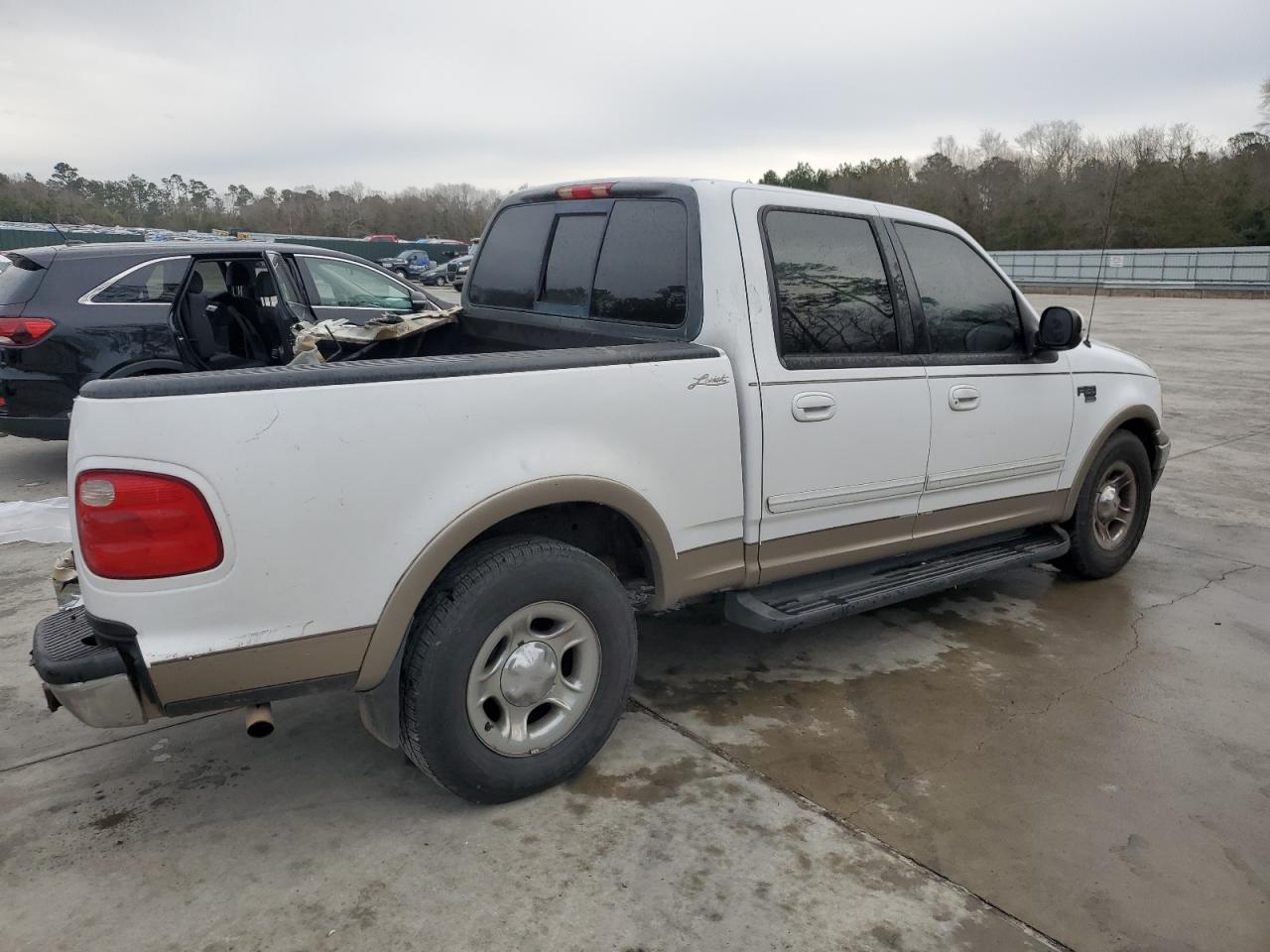 2002 Ford F-150 VIN 1FTRW07L02KA84575 Copart auction photo, rear end / undercarriage damage thumbnail 3