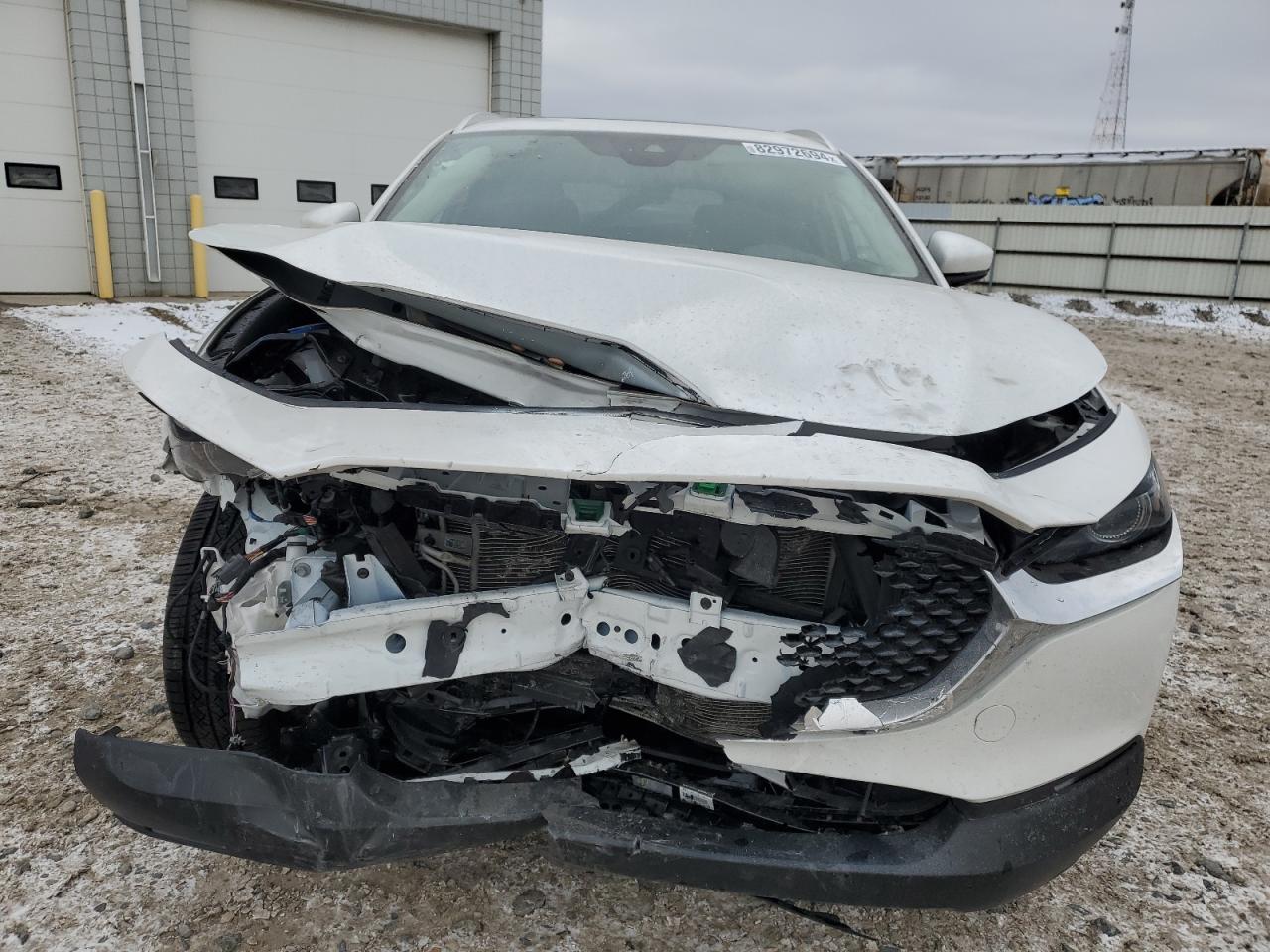 2022 Mazda CX-30 VIN 3MVDMBDLXNM438694 Copart auction photo, front end damage thumbnail 5
