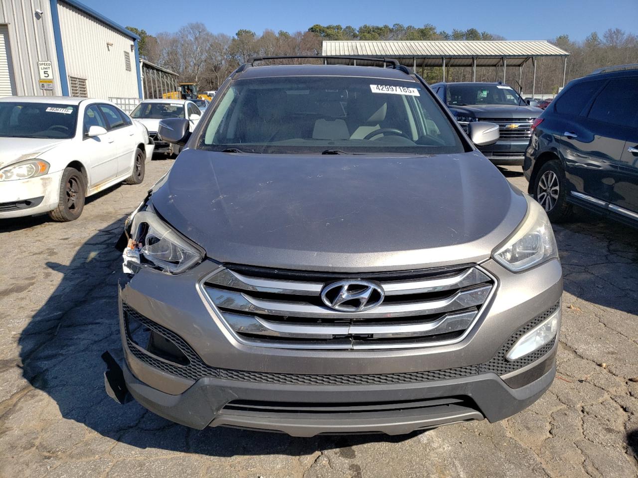 2015 Hyundai Santa Fe VIN 5XYZU3LB5FG247625 Copart auction photo, front end damage thumbnail 5