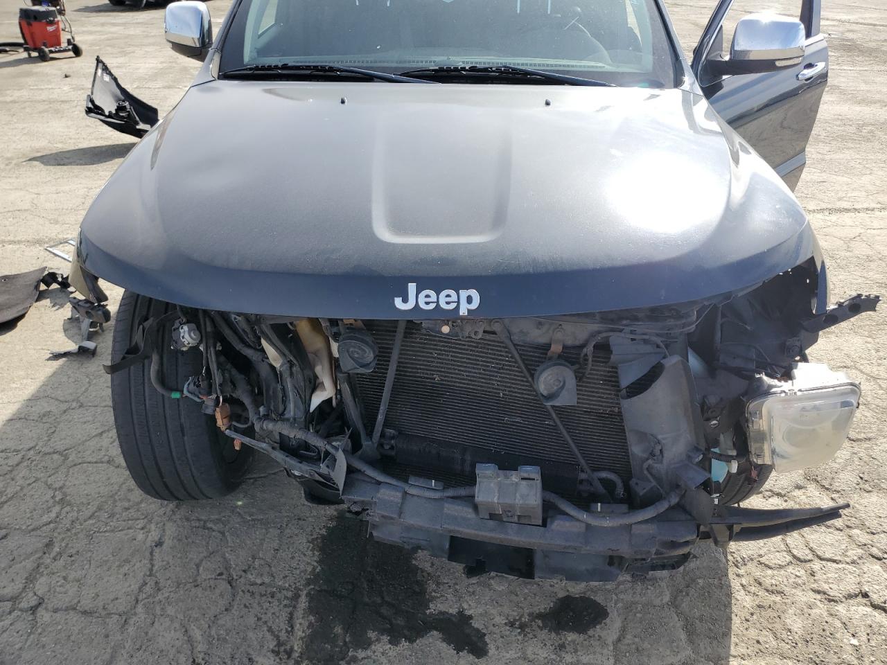2012 Jeep Grand Cherokee VIN 1C4RJFBT2CC116768 Copart auction photo, front end damage thumbnail 13