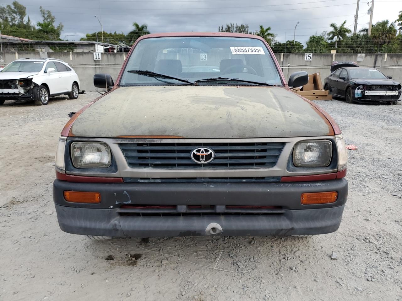 1995 Toyota Tacoma VIN 4TAUN53B1SZ002010 Copart auction photo, side / minor dent/scratches damage thumbnail 5