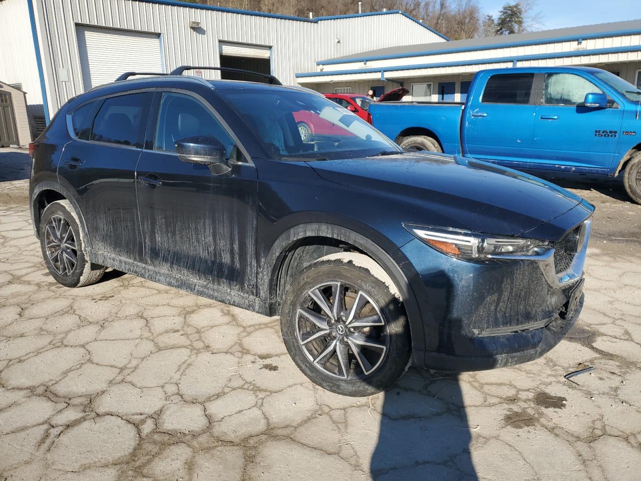 2018 Mazda CX-5 VIN JM3KFBDM8J0399975 Copart auction photo, rear end damage thumbnail 4