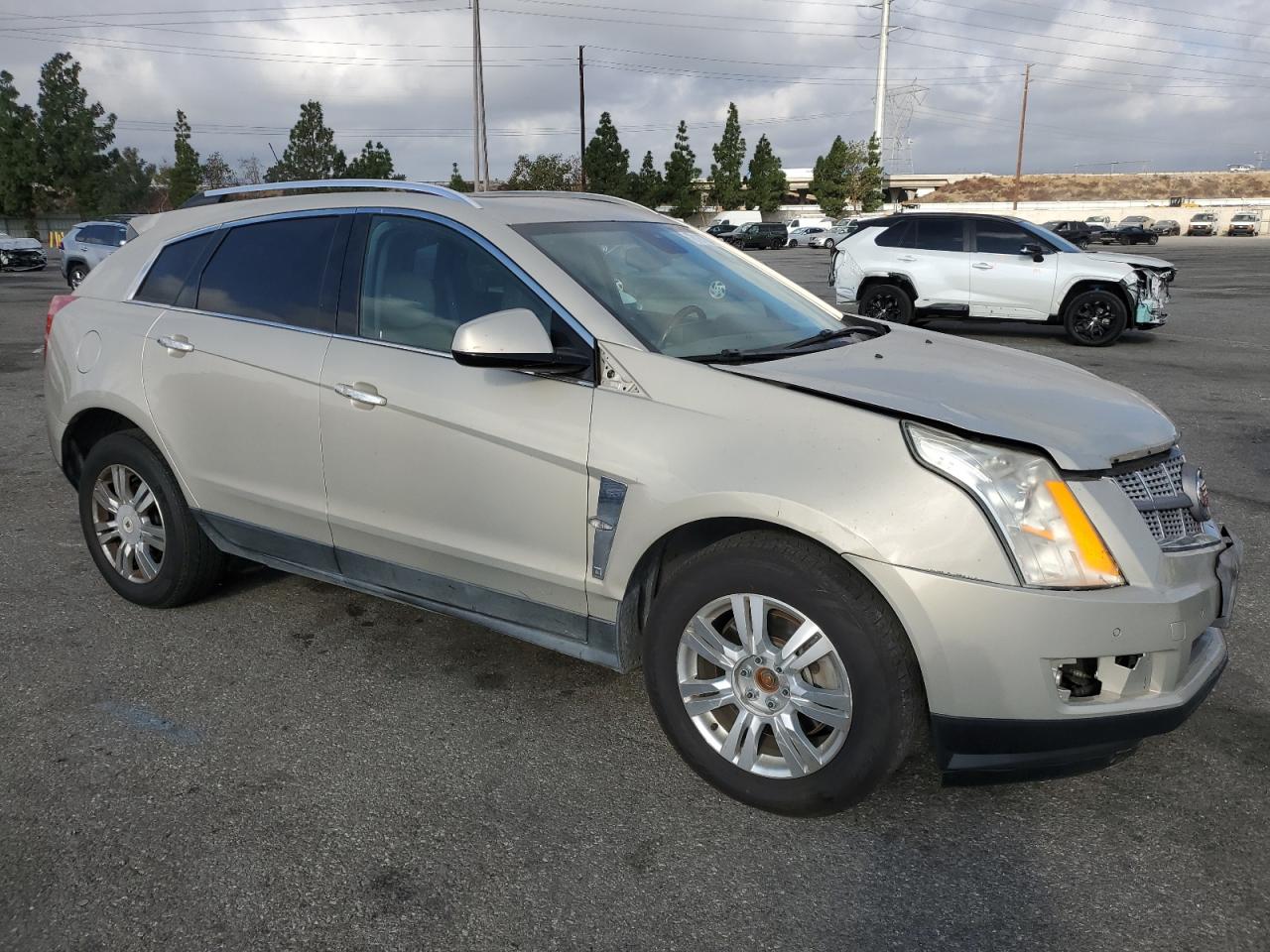 2011 Cadillac SRX VIN 3GYFNAEY9BS597476 Copart auction photo, front end damage thumbnail 4