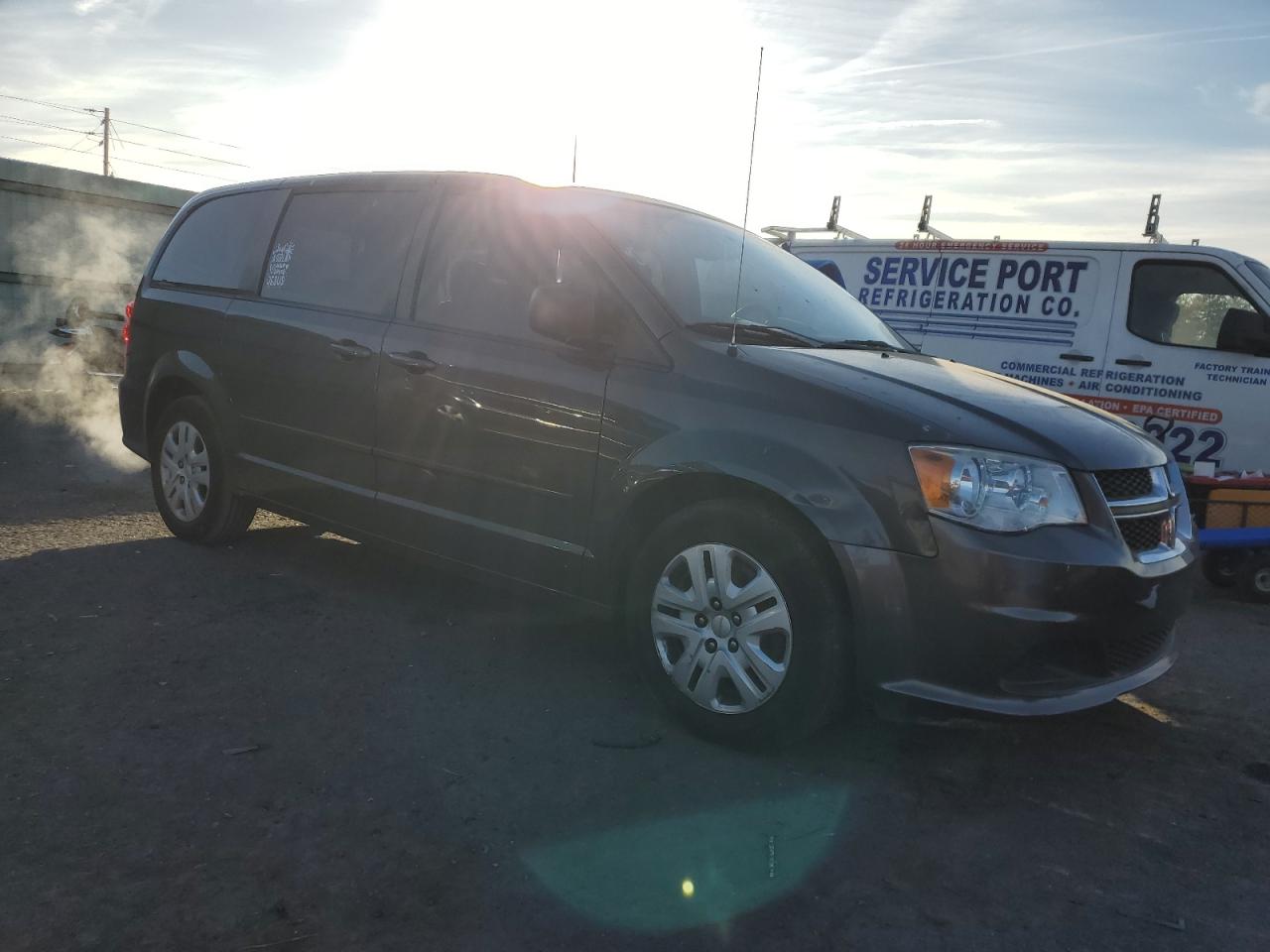 2015 Dodge Caravan VIN 2C4RDGBG0FR599057 Copart auction photo, rear end / side damage thumbnail 4