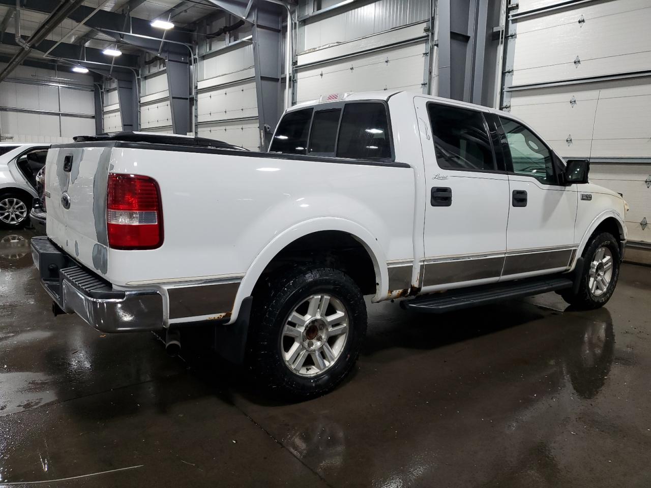 2004 Ford F-150 VIN 1FTPW14554KA84464 Copart auction photo, burn damage thumbnail 3