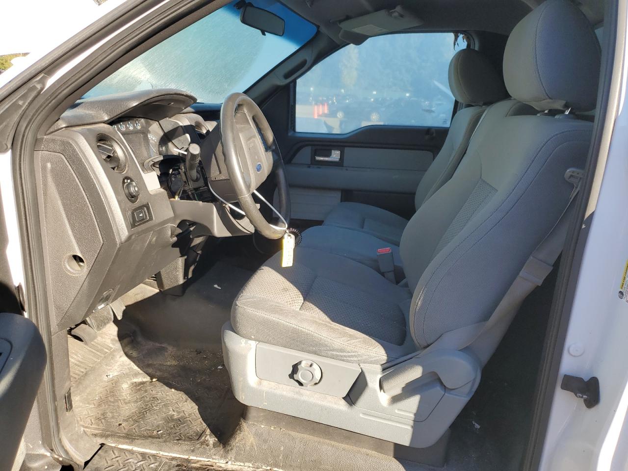 2014 Ford F-150 VIN 1FTNF1CF8EKE27111 Copart auction photo, vandalism damage thumbnail 7