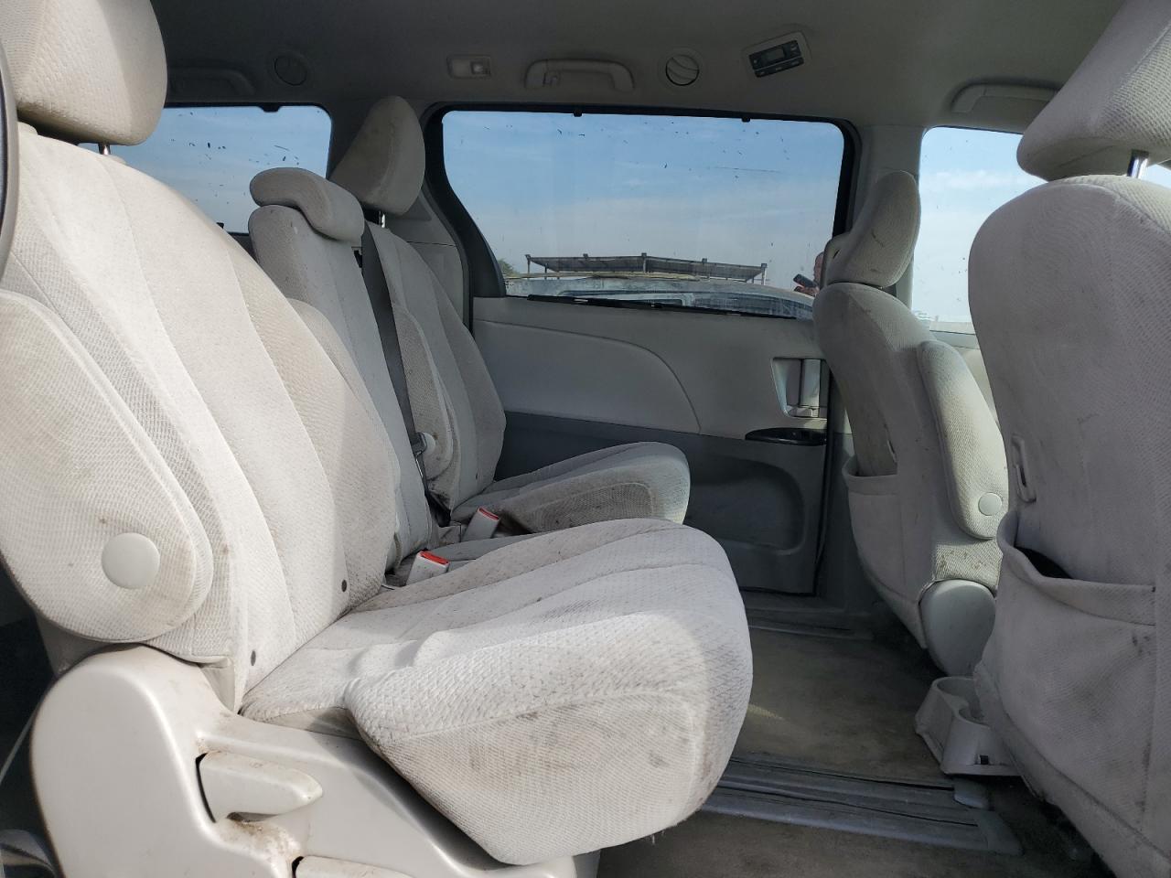 2014 Toyota Sienna VIN 5TDKK3DC9ES477331 Copart auction photo, all over damage thumbnail 11