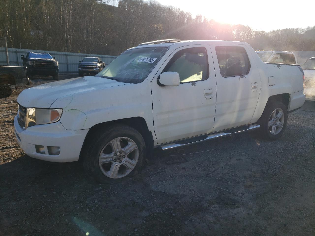 2011 Honda Ridgeline VIN 5FPYK1F52BB010305 - Copart auction photo