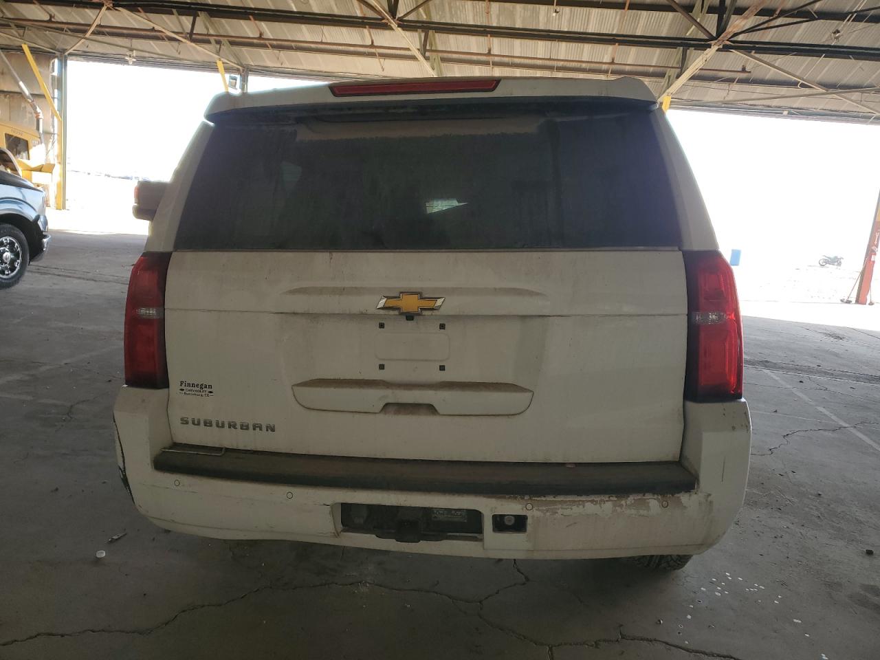 2015 Chevrolet Suburban VIN 1GNSCJKC3FR585391 Copart auction photo, all over damage thumbnail 6