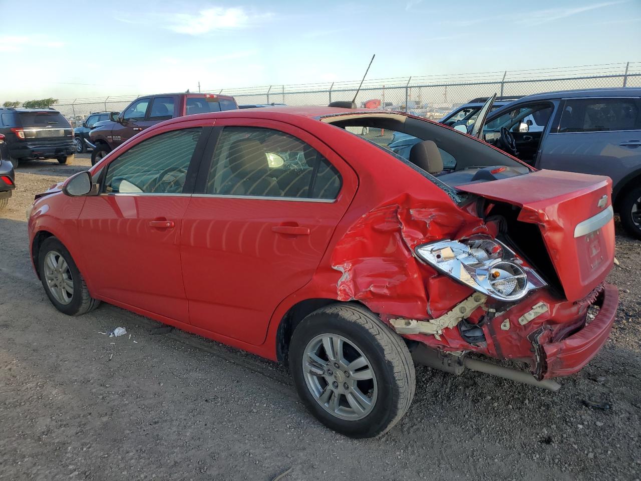 2016 Chevrolet Sonic VIN 1G1JC5SH4G4117992 Copart auction photo, rear end / minor dent/scratches damage thumbnail 2