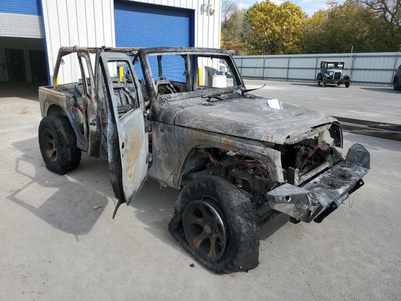 2008 Jeep Wrangler VIN 1J4GA391X8L528268 Copart auction photo, burn damage thumbnail 4