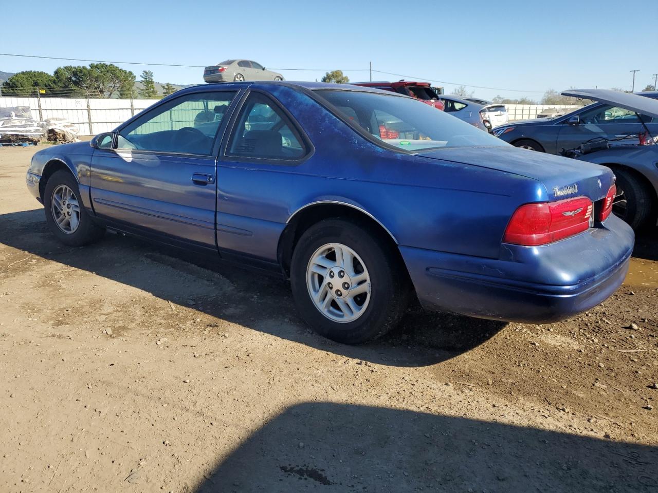 1997 Ford Thunderbird VIN 1FALP6247VH129234 Copart auction photo, minor dent/scratches damage thumbnail 2
