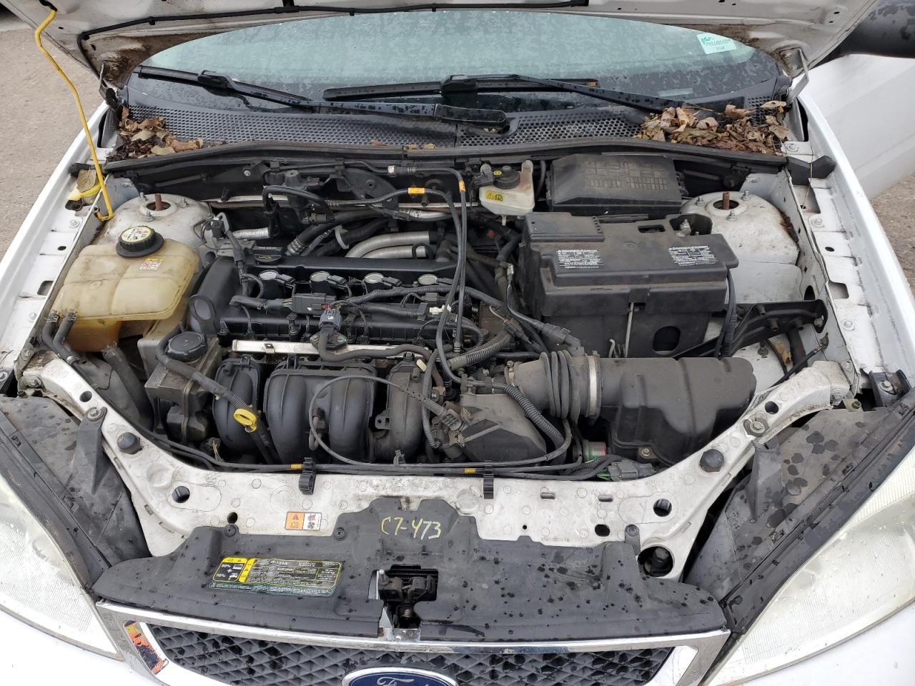 2007 Ford Focus VIN 1FAFP31N47W204931 Copart auction photo, side / mechanical damage thumbnail 11